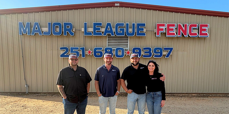 Major League Fence owners and leadership team standing in front of their official building in Saraland, AL