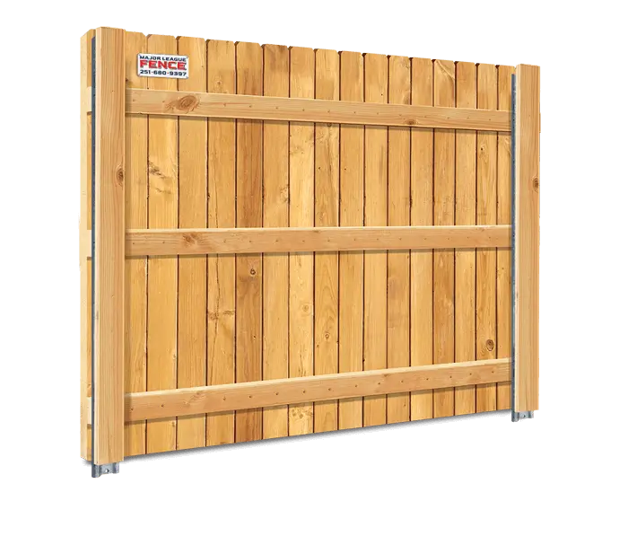 Wood fence panel with galvanized steel PostMaster posts and wood sleeve covering them