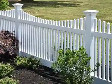 White scalloped picket decorative vinyl fence
